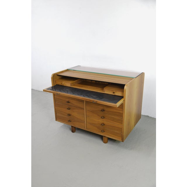 A rare and refined model 804 writing desk, designed by architect and designer Gianfranco Frattini for Casa Bernini in the...