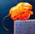 This oil on canvas artwork features a vividly rendered habanero pepper, its bright orange hues contrasting sharply against...