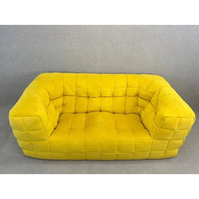 The sofa was upholstered by previous owner This piece has an attribution mark, I am sure that it is completely authentic...