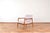 This armchair was designed in the 1960s by Alf Svensson and manufactured by Dux. The wooden frame of the armchair is made...