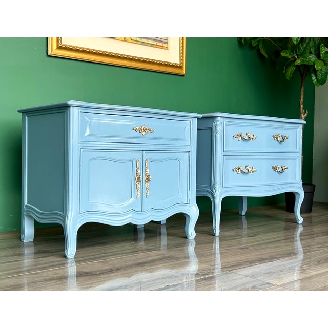 This is a pair of solid built French Provincial nightstands These nightstands are newly refinished in light blue high...