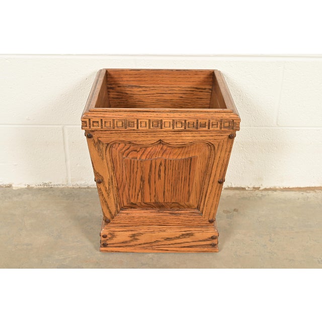 An exceptional Nordic Rustic European carved solid oak planter or waste bin By Romweber, "Viking Oak" Collection USA,...