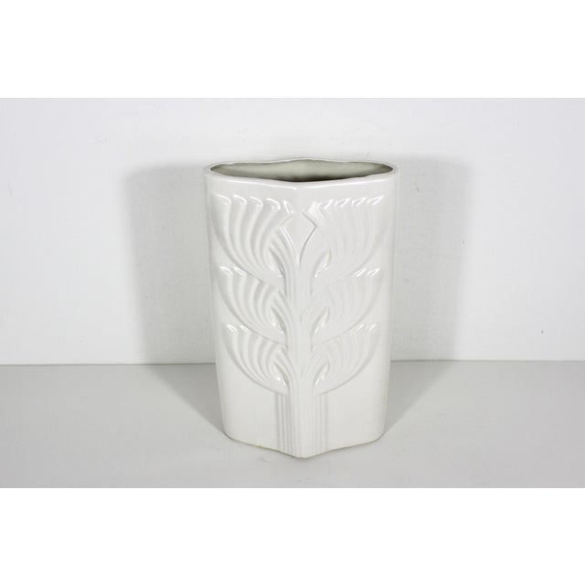 Vintage white porcelain vase made in Germany in the 60’s. It is mid century modern pop art style and would look great in...