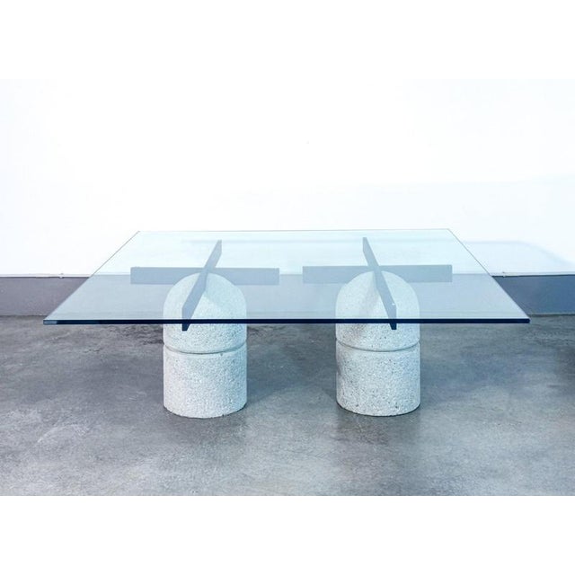 Paracarro table, designed by giovanni offredi for saporiti. Glass top, double concrete base. Origin italy period 1973...