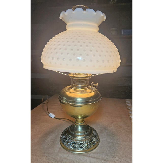 This rare Bradley and Hubbard hurricane lamp from the 1880s has been electrified and features an original hobnail hand...