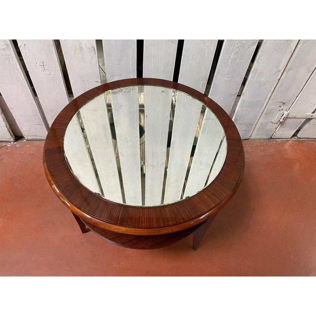 "Art Deco pedestal table " Art Deco pedestal table in mahogany, mirrored top, double top re-varnished. This piece is...