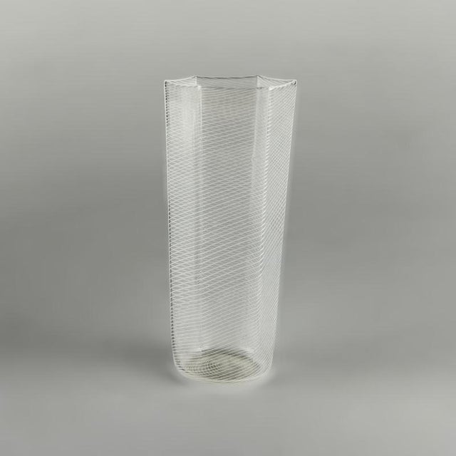 An extraordinarily rare set of nine hand-blown "Reticello" drinking glasses designed by Carlo Scarpa during his earliest...