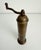 Antique brass mill or grinder for coffee, spices, salt and pepper adorned with etched botanical and grapevine patterns....