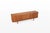 A refined example of scandinavian craftsmanship from the 1960s, this vintage teak sideboard was designed by henry w. Klein...