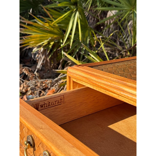 Vintage writing desk by Whitecraft featuring a beautifully crafted bamboo and rattan frame topped with fitted glass. The...