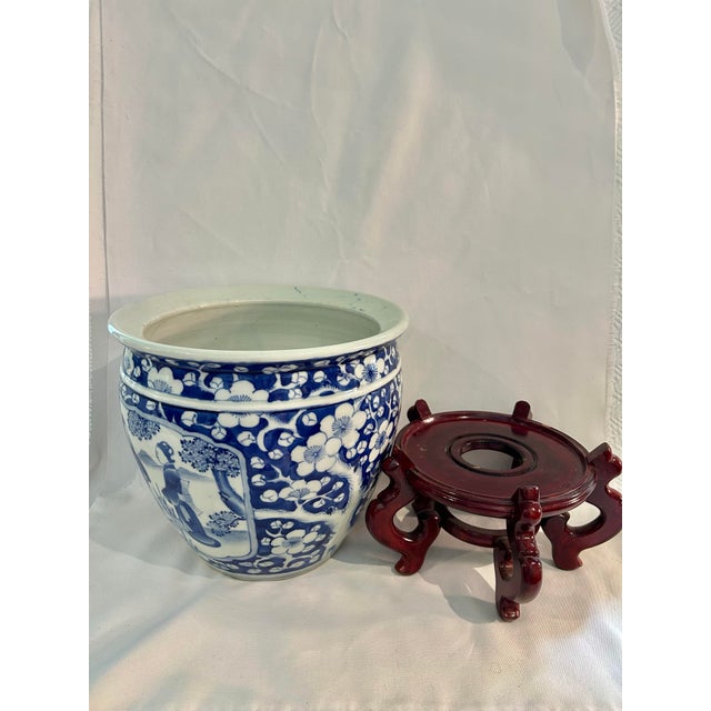 Circa 1900 Chinese Blue & White Prunus Figural Porcelain Jardinière With Wood Stand For Sale In New Orleans - Image 6 of 12