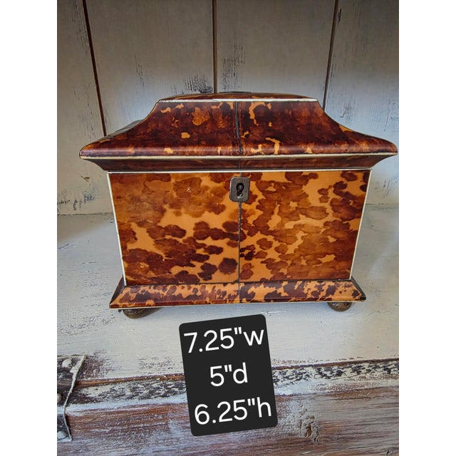 Beautiful circa 1800 English Tea caddy box with faux tortoiseshell and faux ivory details. This is not perfect but overall...