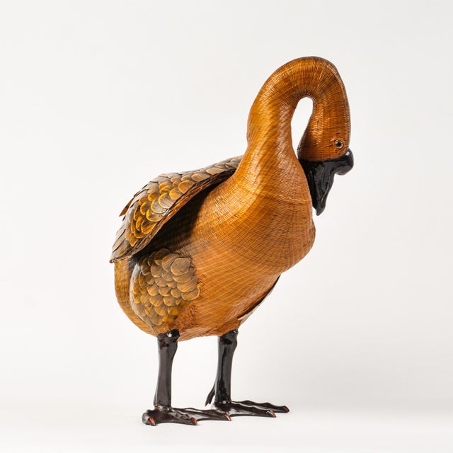 This is an exceptional piece of Mid Century Zhejiang Wicker in the form of a standing Goose. This larger piece measures ~...