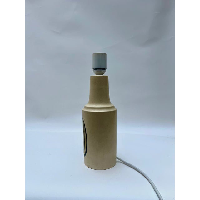 Beautiful large Danish design ceramic table lamp with fabric shade by Okela Stoneware from Denmark. The base is beige with...