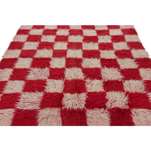 Hand-knotted in wool, this 7x7 vintage Tulu rug, circa 1950-1960, is among the family of Tulus with minimalist checkered...