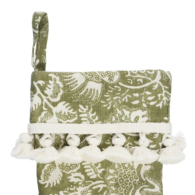 Featuring Schumacher’s ever-popular Pomegranate Print in a soft olive-green hue and trimmed with snow-white tassel fringe,...