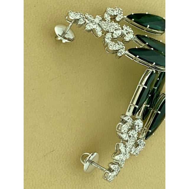 110 Carat Tear Drop Green Tourmaline & 25 Ct Diamond Necklace Suite 18 Karat white Gold This extraordinary Necklace is...