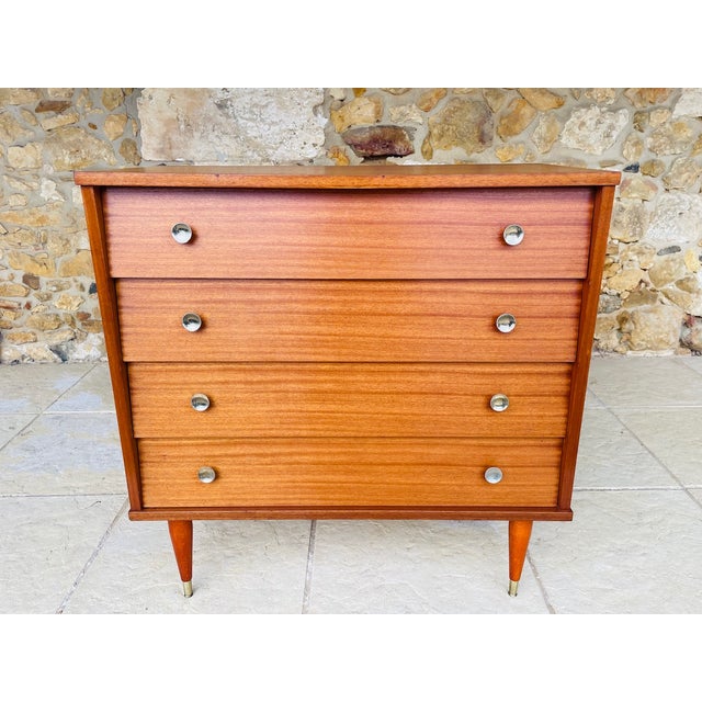 Beautiful, mid-century vintage, chest of drawers, circa 60's/ 70's. Piece is made of wood, with a tiger-striped,teak-...