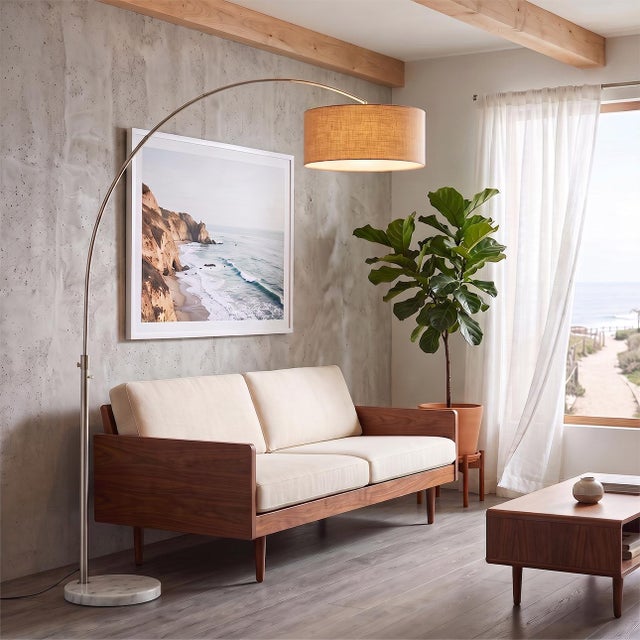 An authentic 1960s design by Peter Morelli, reborn for modern homes, this satin nickel and marble arc lamp isn't a...