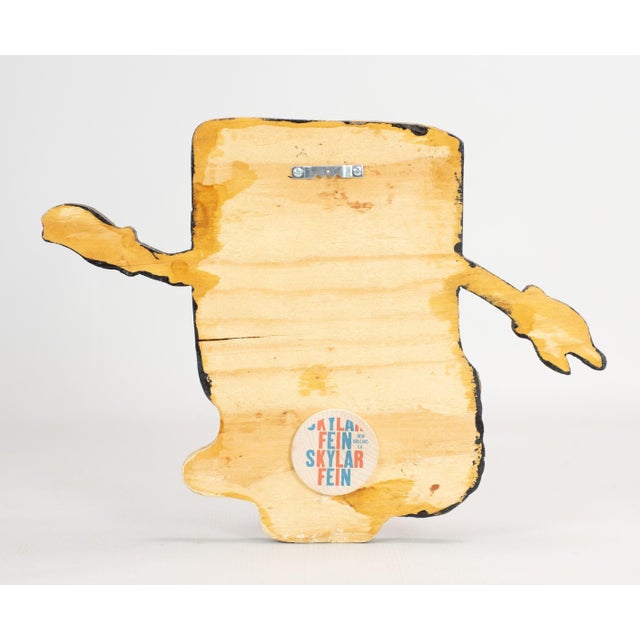 Skylar Fein, (American, 1968-), carved wood painted sculpture "Telephone Man", black paint on weathered wood, Cartoon...