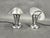 Elegant pair of bauhaus table lamps from 1930s czechoslovakia. Crafted from chrome plated metal, each lamp features a...