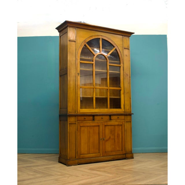 This high-quality cherry wood bookcase from De Bournais, made in France in the early 2000s, features lockable glazed doors...