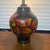 1940s Gorgeous Moorcroft Pottery Black Vase With Orange and Yellow Lamp Attributed to William Moorcroft. For Sale - Image 4 of 6