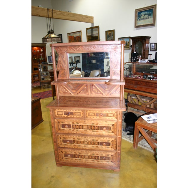 Such a beautiful and unusual buffet. Made from a myriad of woods, this piece was certainly made by a true craftsman. It...
