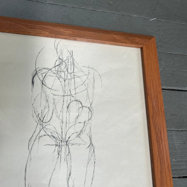 1940’s original male nude Giacometti style ink drawing in oak frame. Measures 11x14 or approximately 13.5x16.5 framed....
