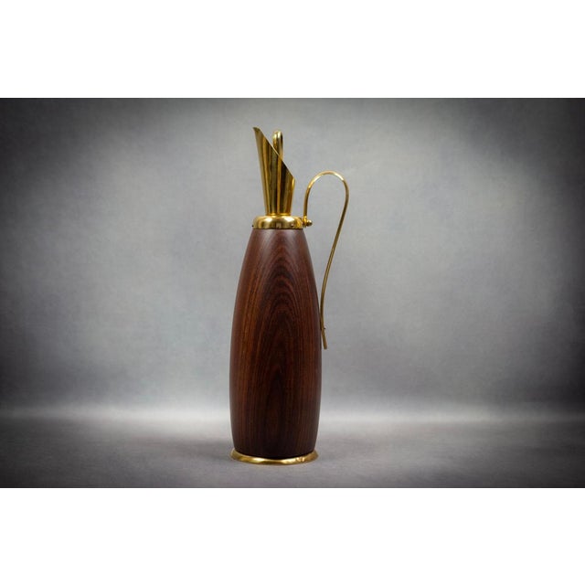 Born in 1909, Aldo Tura began his own furniture production in Lombardy in 1939, straddling Art Deco and Modernism,...