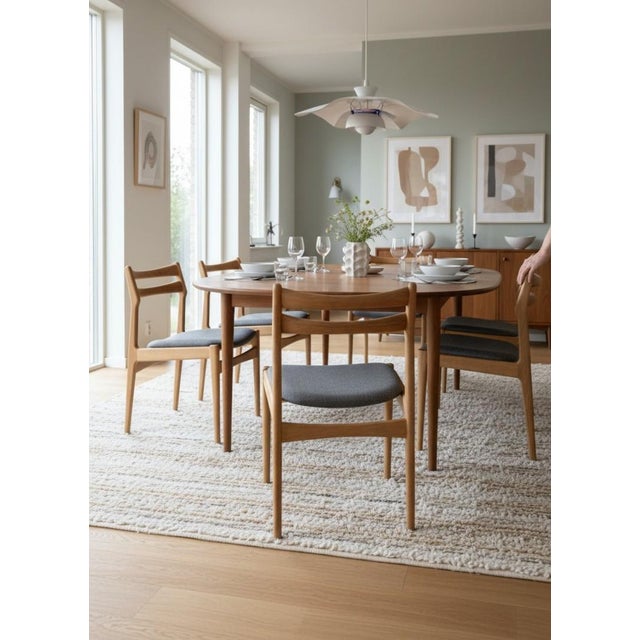 Elegant and timeless chair designed by the renowned Danish designer Johannes Andersen for Vamo Sønderborg, Denmark. A...