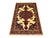 A richly detailed central medallion anchors this natural-dyed wool rug. Deep red, navy, and subtle green motifs stand out...