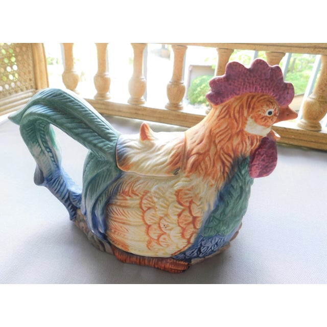 Perfect addition for all the fall days ahead, this colorful ceramic rooster hen tea pot is a real delight. The beautiful...