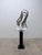 Organic modern aluminum floor sculpture on black enamaled steel base by Curtis Jere Artisan House, 2003.