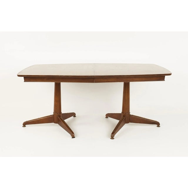 Kent Coffey Mid Century Pedestal Base 10 Seater Walnut Dining Table The table measures: 63.75 wide x 42 deep x 27.5 inches...