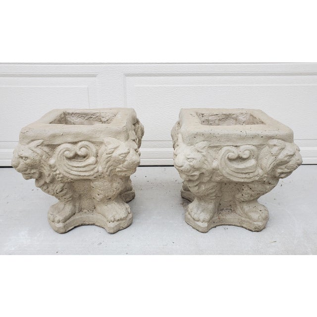 Pair of Early 20th Century Painted Square Cast Stone Lion's Heads and paw feet Planters. The square planters/ garden...