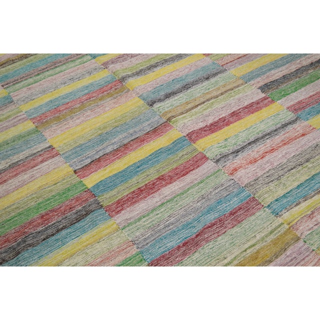 Vintage Turkish hand woven modern kilim with natural colors and geometric pattern.