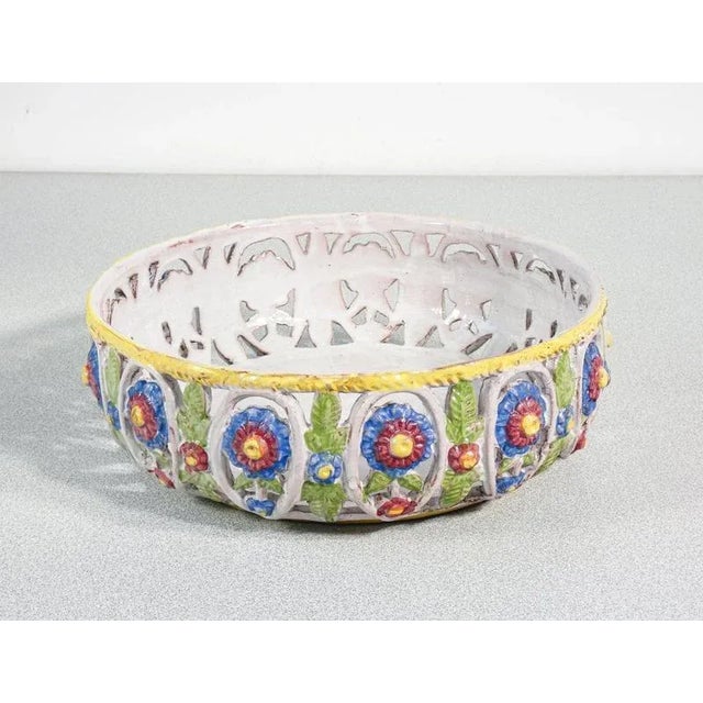 Basket in hand-painted and glazed majolica. Origin italy period 19th century materials glazed and hand-painted majolica...