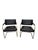 A pair of Jimmy Cooper Leather Armchairs by Industry West, offered in black buffalo leather over a brushed brass...