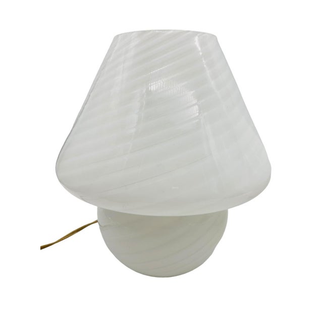 A pair of Vetri Murano swirled glass mushroom table lamps. The 1970's Italian lamps have in-cord on/off switches and...