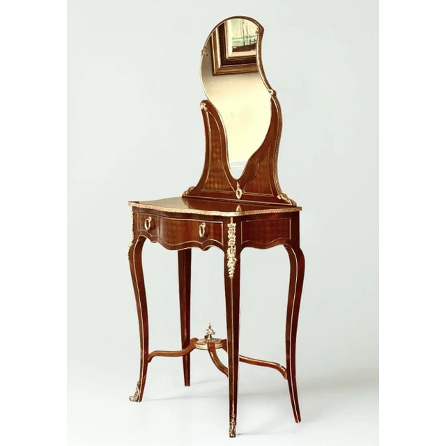 French Louis XV style ormolu-mounted kingwood and satinwood parquetry dressing table or coiffeuse, late 19th century....