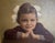 Charming circa 1963 portrait of a young girl, beautifully presented in an ornate gilt frame. The sitter rests her chin on...