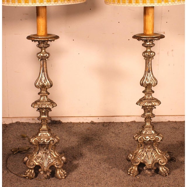 A rare pair of early 19th century silver wood torchieres from Italy. Superb Italian Louis XV style work in carved wood....