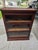 A handsome antique three-stack barrister bookcase crafted from quarter sawn oak and dating to the early twentieth century....