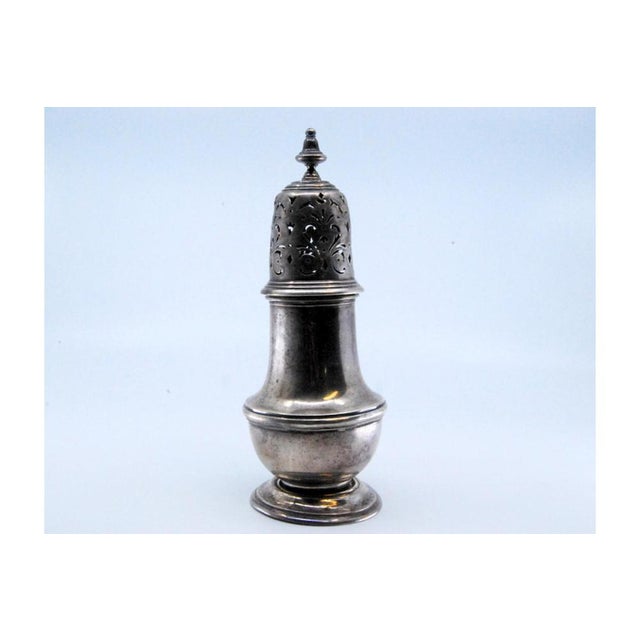 Silver Sprinkler with Smooth Body and Cut-Out Lid with Application, in Very Good conditions. Designed 1920 to 1949 This...