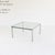 Small table designed by Ross Littell for ICF De Padova, with a minimalist chrome-plated metal frame and transparent glass...
