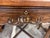 Gorgeous side table in the Chippendale style. Detailed basketweave top with a retractable shelf. In a rich walnut wood,...