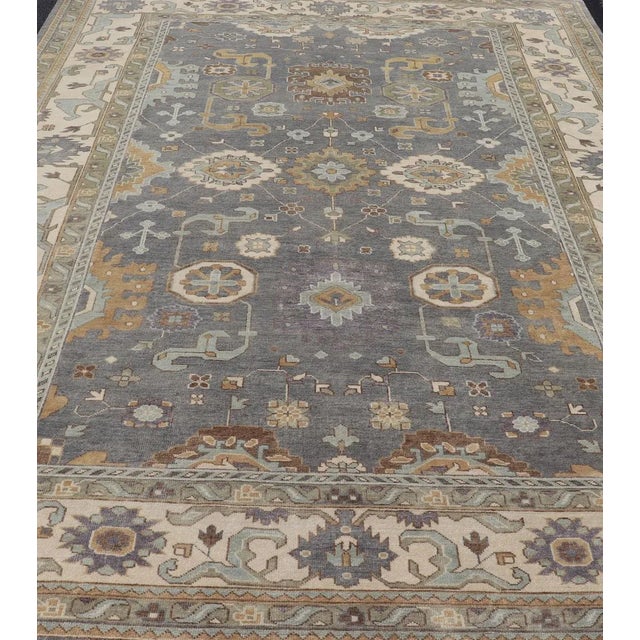 2010s Indian Wool Floral Oushak Area Rug Hand-Knotted in Earthy Tones For Sale - Image 5 of 13