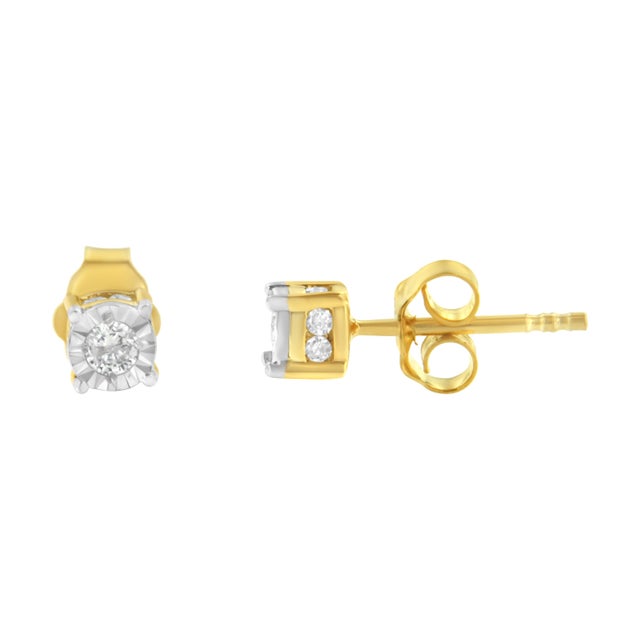 This charming pair of diamond studs features solitaire round brilliant cut diamonds. The classic design is crafted in...