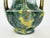 This striking Art Deco stoneware vase was produced by the Pierrefonds manufactory in France, a respected early 20th-...